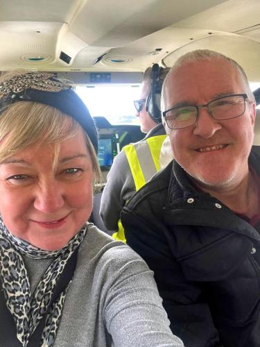Donnamarie and Frank Stamp onboard chase plane 'Saratoga'
